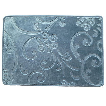 Stylish embossed swirl bath mat design