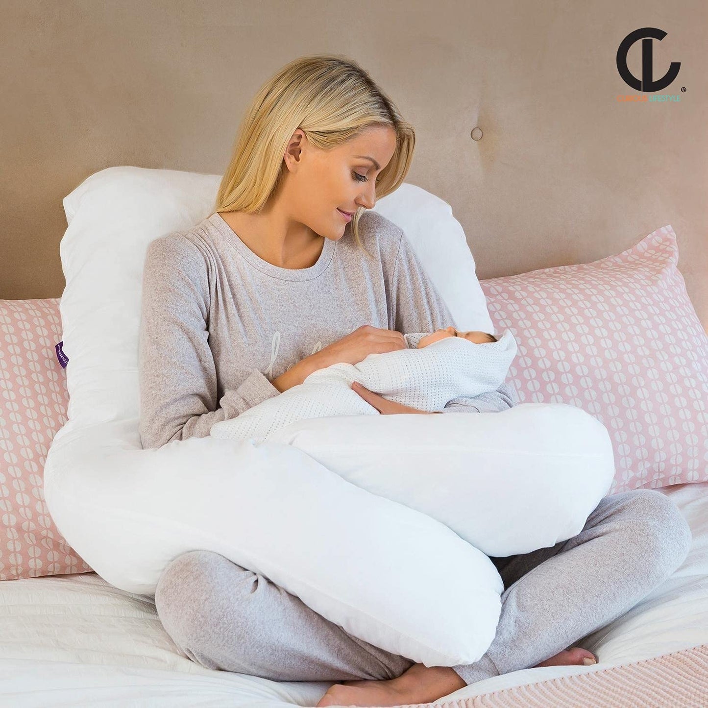 Orthopedic pregnancy pillow supporting back and hip alignment