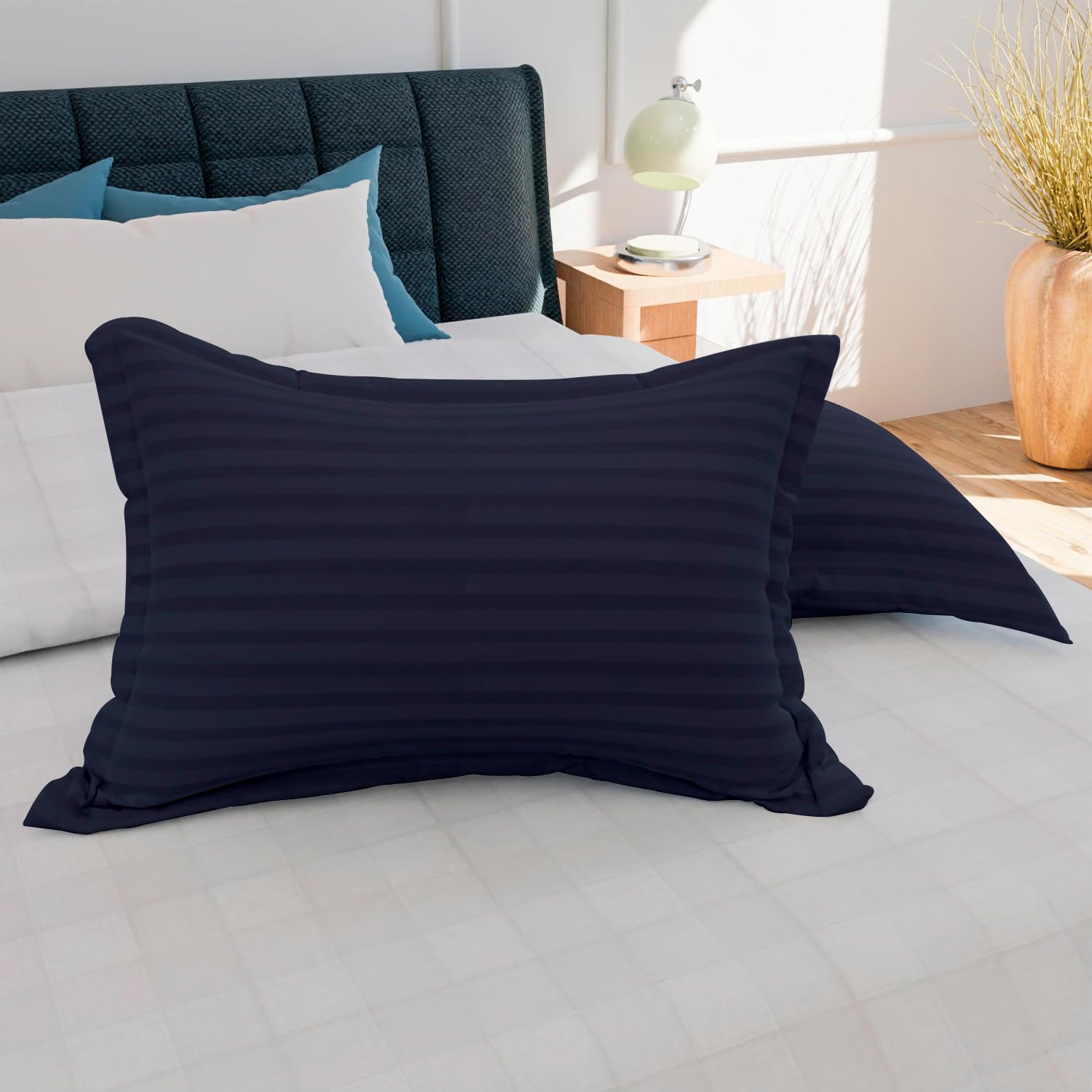 Premium cotton satin stripe pillow cover on bed