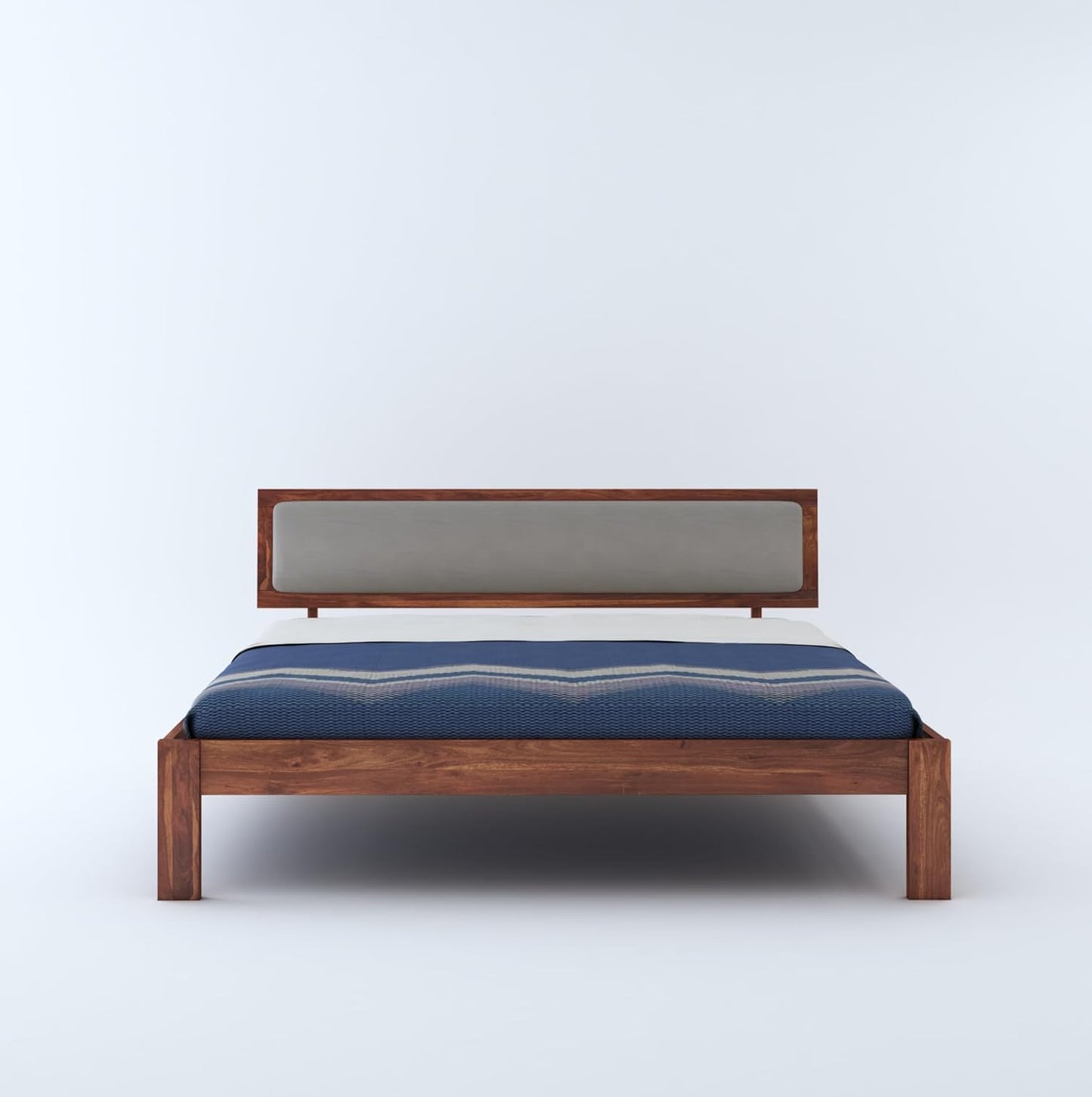 Sheesham wood bed with blue bedsheet

