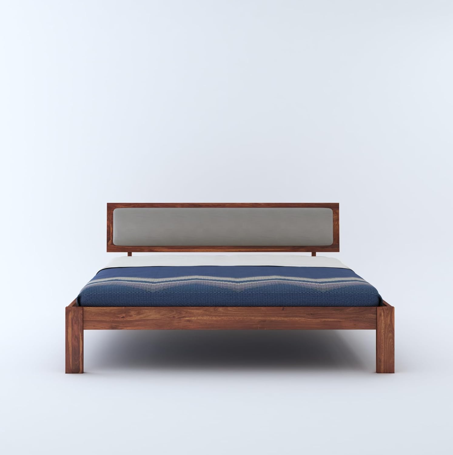 Sheesham wood bed with blue bedsheet

