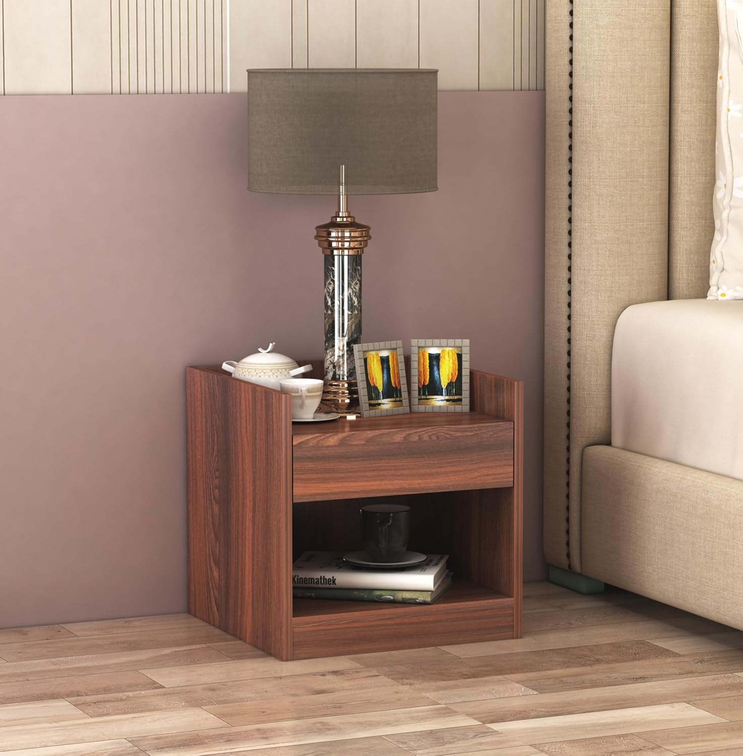 Wooden bedside table with storage placed beside bed